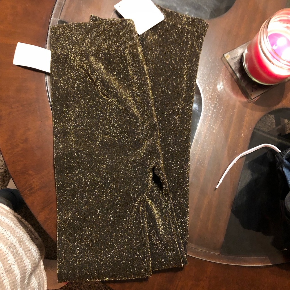 NWT shimmering leggings size L/XL.